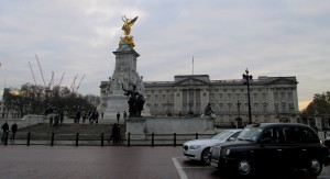 Buckingham Palace with The Queen Victoria Memorial in front.