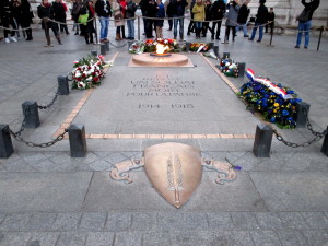 The Tomb of the Unknown Soldier from WWI underneath the Arc de Triomphe. First Lady Jacqueline Kennedy remembered the Tomb's eternal flame from her State visit with her husband, President Kennedy, and requested an eternal flame for her husband's gravesite.